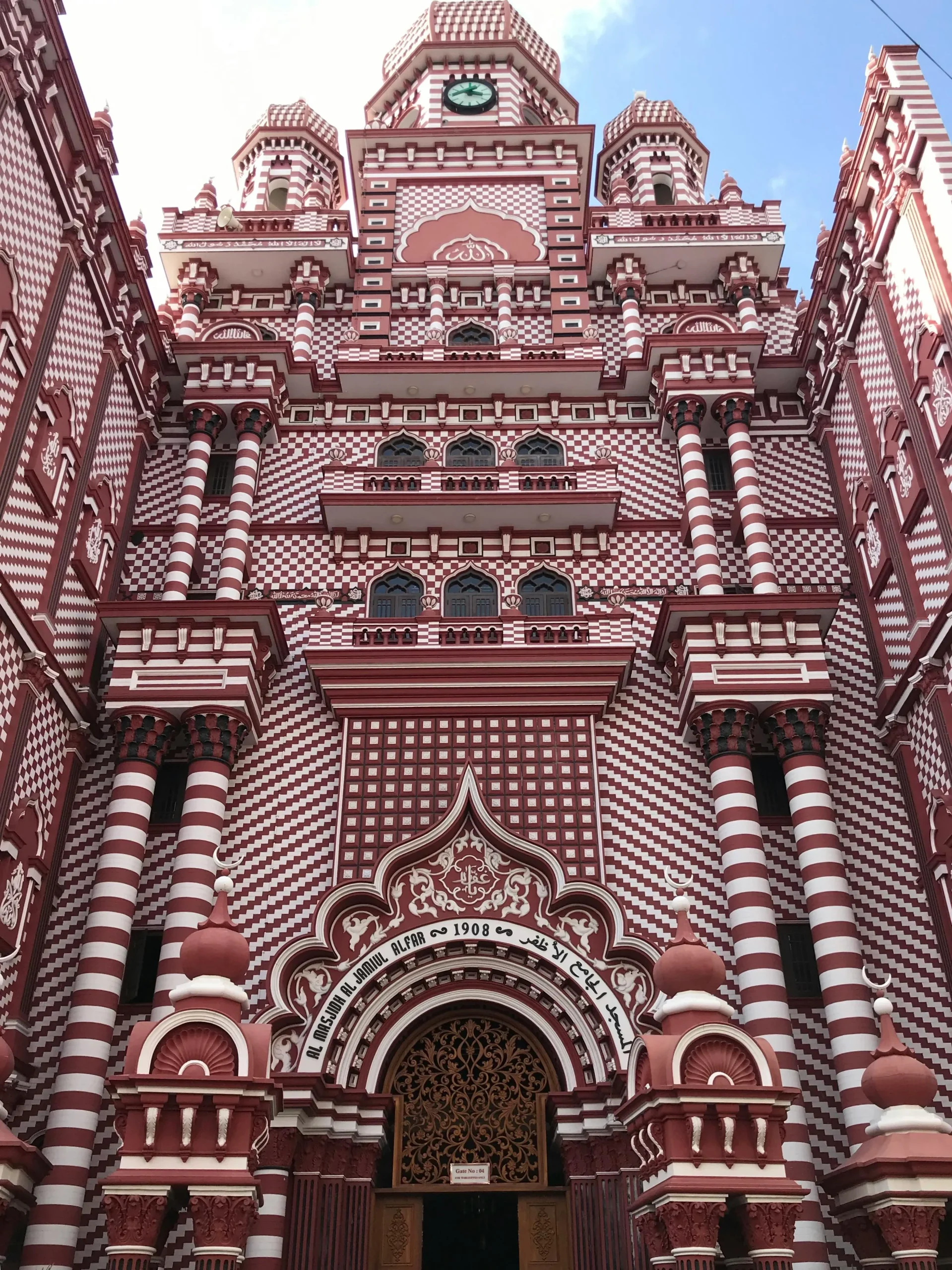 Jami Ul-Alfar Mosque in Colombo with distinctive red and white striped architecture and ornate facade